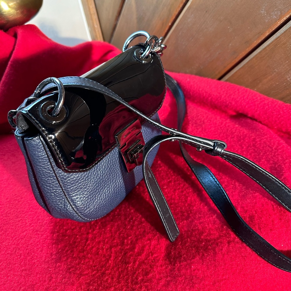 Michael Kors new small bag asking $99